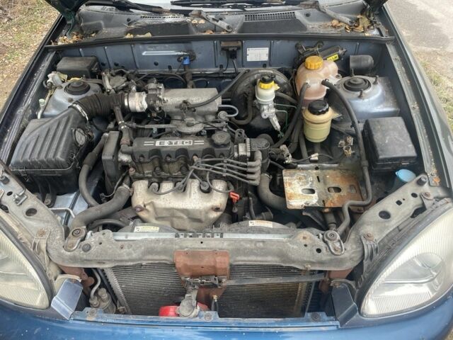 Синій Деу Ланос, об'ємом двигуна 1.5 л та пробігом 250 тис. км за 1050 $, фото 3 на Automoto.ua