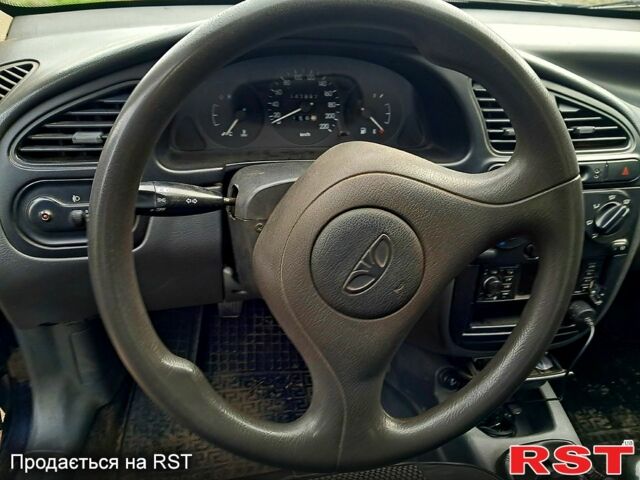 Синий Дэу Ланос, объемом двигателя 1.5 л и пробегом 147 тыс. км за 3000 $, фото 6 на Automoto.ua