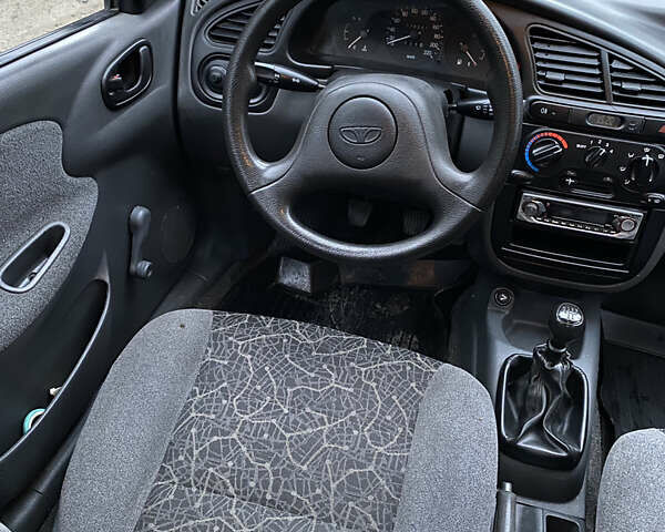 Синій Деу Ланос, об'ємом двигуна 1.5 л та пробігом 76 тис. км за 2850 $, фото 8 на Automoto.ua