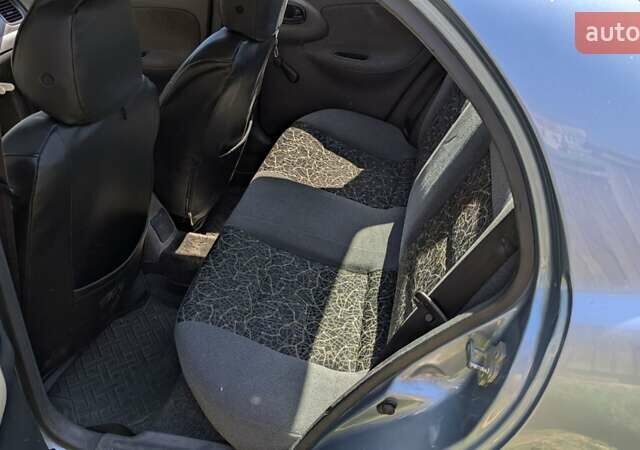 Синий Дэу Ланос, объемом двигателя 1.5 л и пробегом 400 тыс. км за 1900 $, фото 11 на Automoto.ua