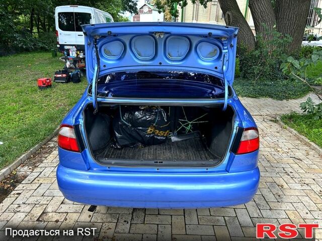 Синий Дэу Ланос, объемом двигателя 1.5 л и пробегом 143 тыс. км за 2750 $, фото 6 на Automoto.ua