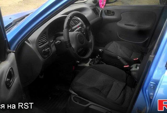 Синий Дэу Ланос, объемом двигателя 1.5 л и пробегом 212 тыс. км за 2600 $, фото 2 на Automoto.ua