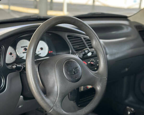 Дэу Ланос 2007 в Запорожье на Automoto.ua Синий Дэу Ланос, объемом двигателя 1.5 л и пробегом 191 тыс. км за 1999 $, фото 10 на Automoto.ua