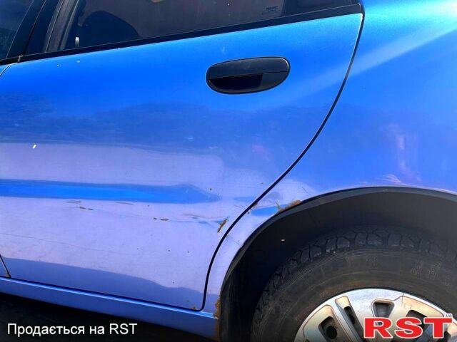 Синий Дэу Ланос, объемом двигателя 1.4 л и пробегом 79 тыс. км за 2200 $, фото 7 на Automoto.ua