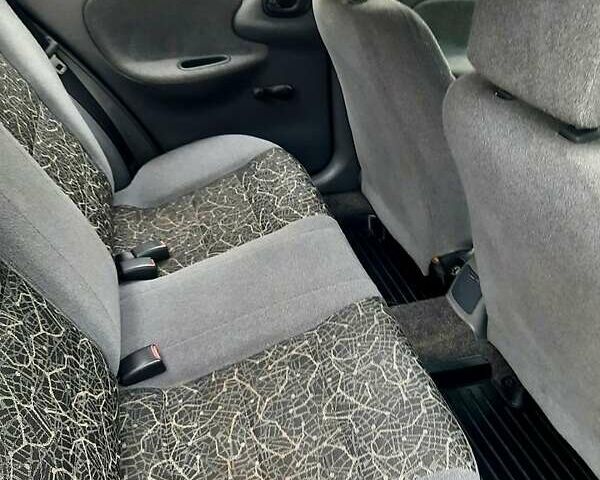 Синій Деу Ланос, об'ємом двигуна 1.5 л та пробігом 220 тис. км за 2000 $, фото 7 на Automoto.ua