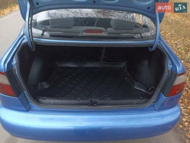 Синий Дэу Ланос, объемом двигателя 1.5 л и пробегом 240 тыс. км за 2550 $, фото 9 на Automoto.ua