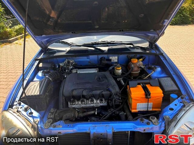 Синий Дэу Ланос, объемом двигателя 1.4 л и пробегом 79 тыс. км за 2200 $, фото 5 на Automoto.ua