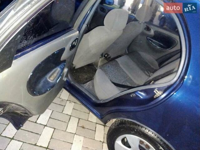 Синій Деу Ланос, об'ємом двигуна 1.5 л та пробігом 227 тис. км за 2100 $, фото 10 на Automoto.ua