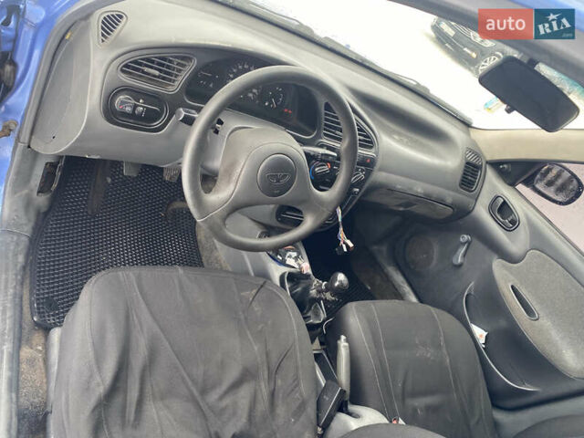 Синий Дэу Ланос, объемом двигателя 1.5 л и пробегом 230 тыс. км за 1750 $, фото 9 на Automoto.ua
