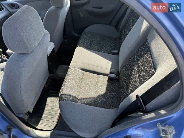 Синий Дэу Ланос, объемом двигателя 1.5 л и пробегом 256 тыс. км за 1550 $, фото 8 на Automoto.ua