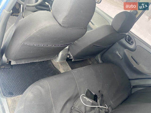 Синий Дэу Ланос, объемом двигателя 1.5 л и пробегом 230 тыс. км за 1750 $, фото 10 на Automoto.ua