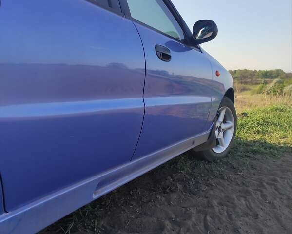 Синий Дэу Ланос, объемом двигателя 1.5 л и пробегом 97 тыс. км за 2900 $, фото 27 на Automoto.ua