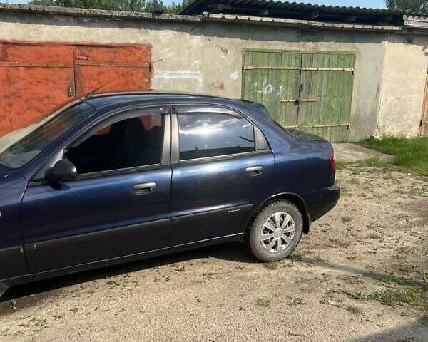 Синий Дэу Ланос, объемом двигателя 1.5 л и пробегом 65 тыс. км за 3400 $, фото 8 на Automoto.ua