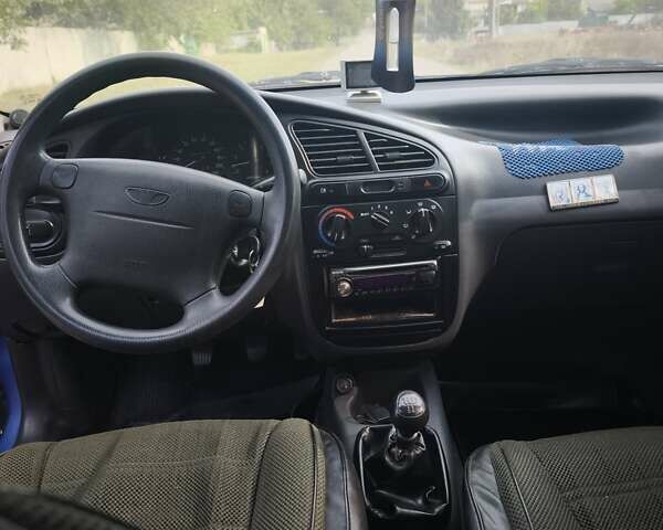Синий Дэу Ланос, объемом двигателя 1.6 л и пробегом 1 тыс. км за 2600 $, фото 4 на Automoto.ua