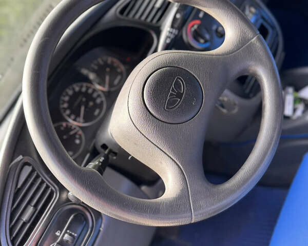 Синий Дэу Ланос, объемом двигателя 1.5 л и пробегом 250 тыс. км за 3600 $, фото 11 на Automoto.ua