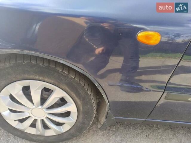 Деу Ланос 2007 у Вінниці на Automoto.ua Синій Деу Ланос, об'ємом двигуна 1.5 л та пробігом 270 тис. км за 1750 $, фото 12 на Automoto.ua
