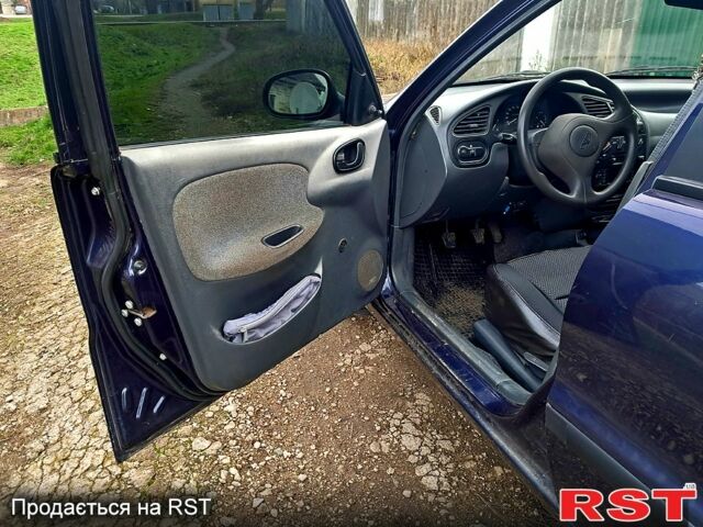 Синий Дэу Ланос, объемом двигателя 1.5 л и пробегом 147 тыс. км за 3000 $, фото 4 на Automoto.ua