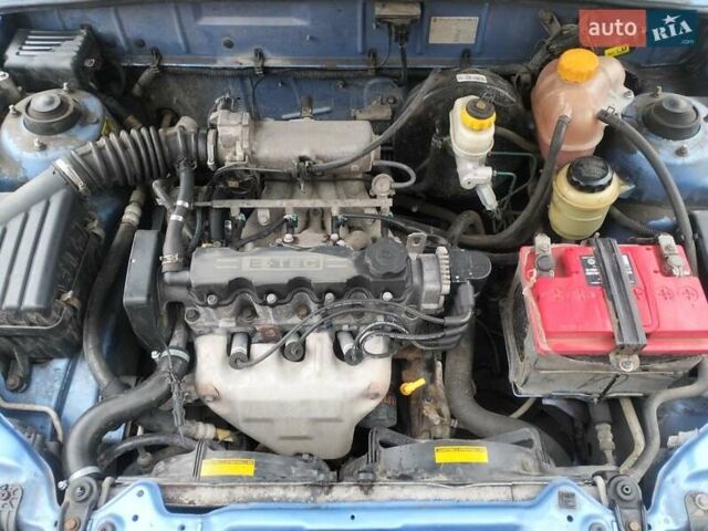 Синий Дэу Ланос, объемом двигателя 1.5 л и пробегом 295 тыс. км за 2600 $, фото 7 на Automoto.ua