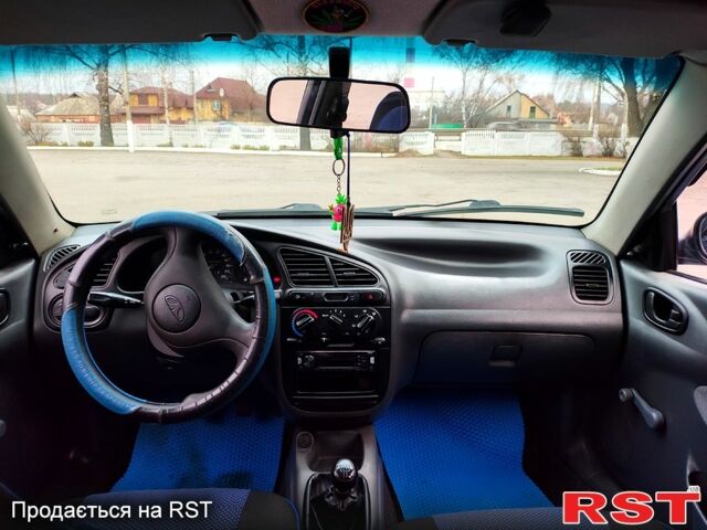 Синий Дэу Ланос, объемом двигателя 1.5 л и пробегом 193 тыс. км за 1850 $, фото 11 на Automoto.ua