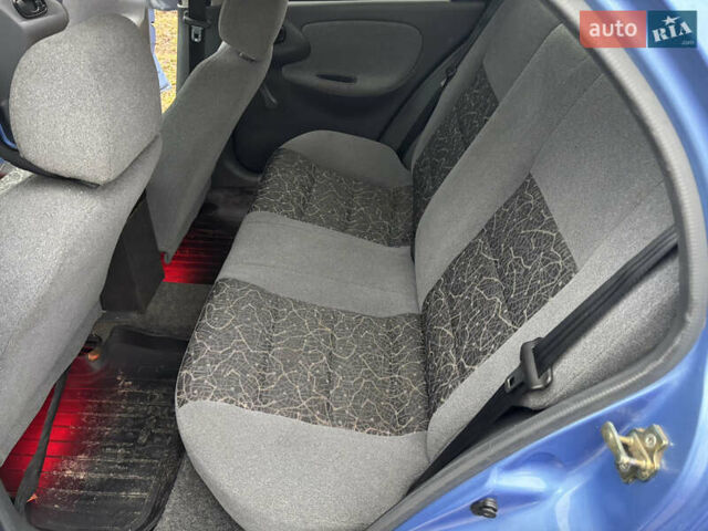 Синій Деу Ланос, об'ємом двигуна 1.39 л та пробігом 200 тис. км за 2350 $, фото 6 на Automoto.ua