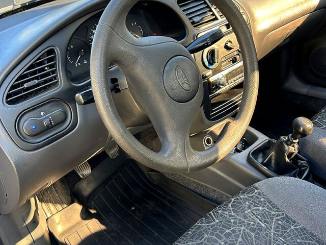 Синий Дэу Ланос, объемом двигателя 1.5 л и пробегом 180 тыс. км за 2800 $, фото 7 на Automoto.ua