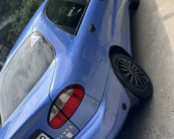 Синий Дэу Ланос, объемом двигателя 1.5 л и пробегом 250 тыс. км за 3600 $, фото 5 на Automoto.ua