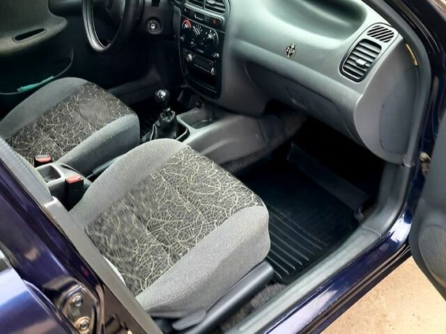 Синий Дэу Ланос, объемом двигателя 1.5 л и пробегом 220 тыс. км за 2000 $, фото 5 на Automoto.ua