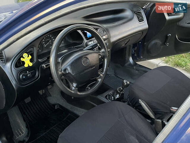 Синій Деу Ланос, об'ємом двигуна 1.5 л та пробігом 140 тис. км за 1450 $, фото 11 на Automoto.ua