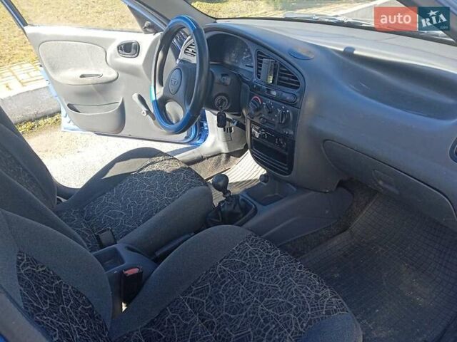 Синий Дэу Ланос, объемом двигателя 1.4 л и пробегом 201 тыс. км за 2000 $, фото 11 на Automoto.ua