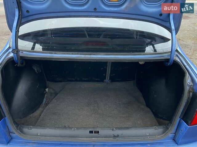 Синій Деу Ланос, об'ємом двигуна 1.5 л та пробігом 350 тис. км за 1100 $, фото 4 на Automoto.ua
