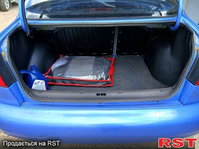 Синий Дэу Ланос, объемом двигателя 1.5 л и пробегом 195 тыс. км за 3200 $, фото 3 на Automoto.ua