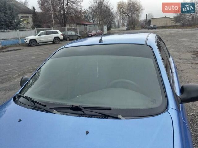 Синий Дэу Ланос, объемом двигателя 1.5 л и пробегом 113 тыс. км за 1800 $, фото 6 на Automoto.ua