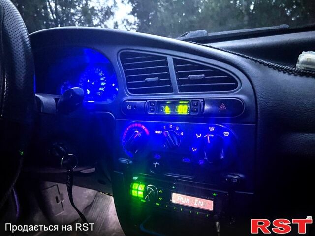 Синій Деу Ланос, об'ємом двигуна 1.4 л та пробігом 200 тис. км за 1999 $, фото 6 на Automoto.ua