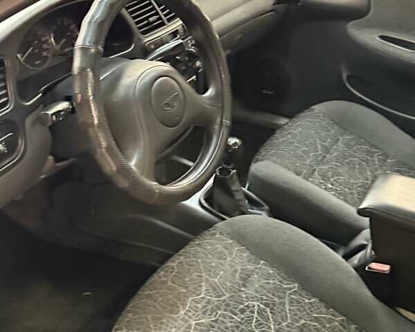 Дэу Ланос 2007 в Запорожье на Automoto.ua Синий Дэу Ланос, объемом двигателя 1.5 л и пробегом 240 тыс. км за 2600 $, фото 13 на Automoto.ua