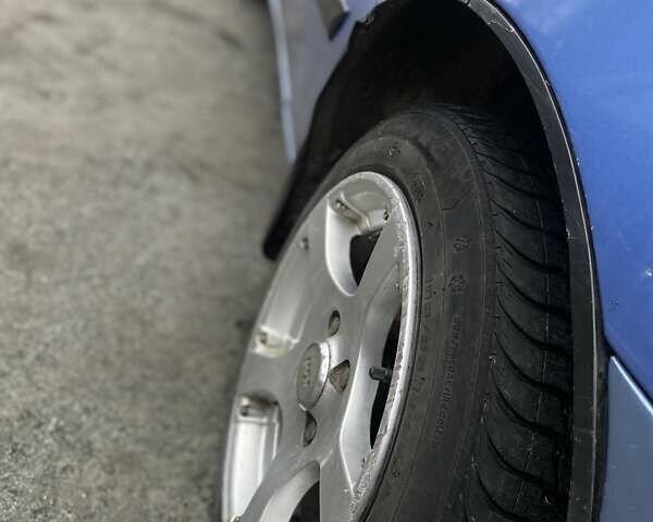 Синий Дэу Ланос, объемом двигателя 1.5 л и пробегом 215 тыс. км за 2350 $, фото 8 на Automoto.ua