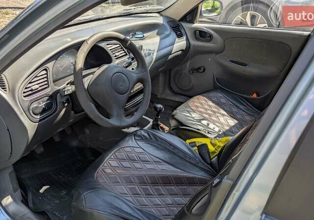 Синий Дэу Ланос, объемом двигателя 1.5 л и пробегом 400 тыс. км за 1900 $, фото 4 на Automoto.ua