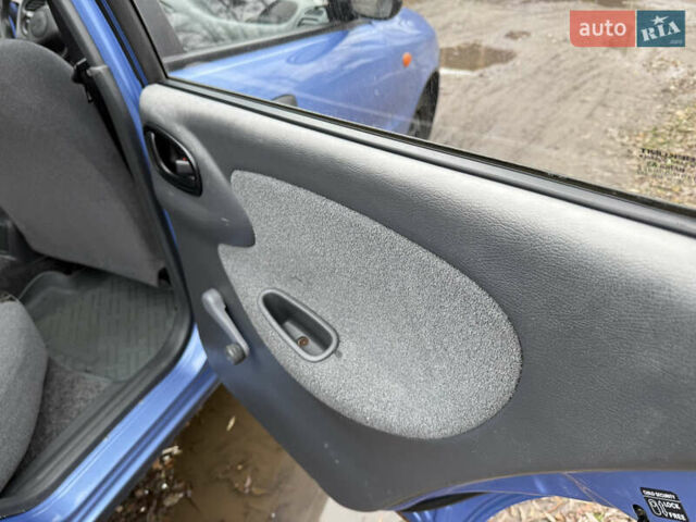 Синий Дэу Ланос, объемом двигателя 1.4 л и пробегом 224 тыс. км за 1390 $, фото 17 на Automoto.ua