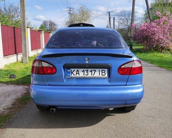 Синий Дэу Ланос, объемом двигателя 1.5 л и пробегом 330 тыс. км за 2300 $, фото 4 на Automoto.ua
