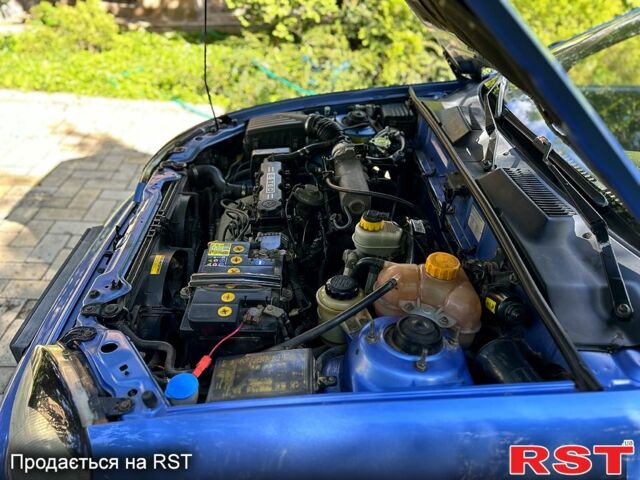 Синий Дэу Ланос, объемом двигателя 1.5 л и пробегом 143 тыс. км за 2750 $, фото 2 на Automoto.ua