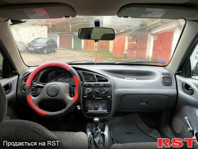 Синій Деу Ланос, об'ємом двигуна 1.5 л та пробігом 245 тис. км за 1650 $, фото 7 на Automoto.ua