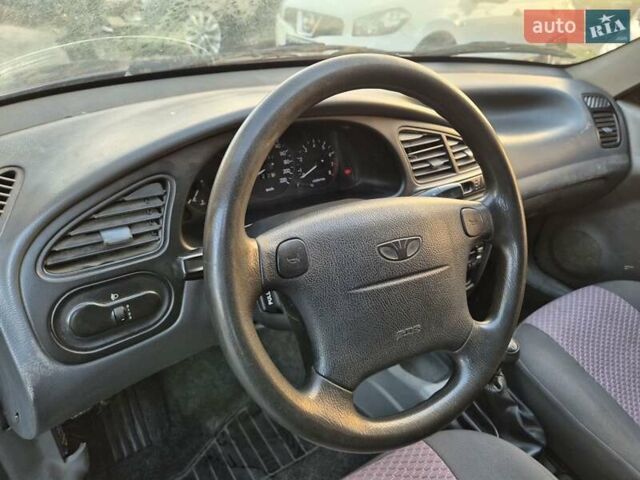 Синий Дэу Ланос, объемом двигателя 1.6 л и пробегом 125 тыс. км за 1600 $, фото 16 на Automoto.ua