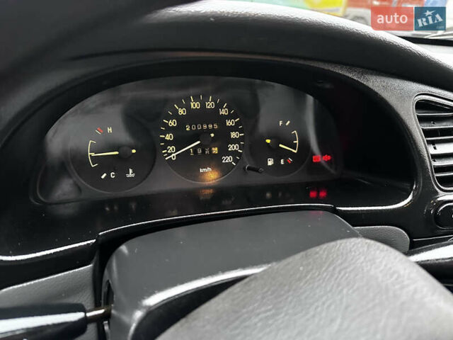 Синій Деу Ланос, об'ємом двигуна 1.5 л та пробігом 201 тис. км за 2500 $, фото 24 на Automoto.ua