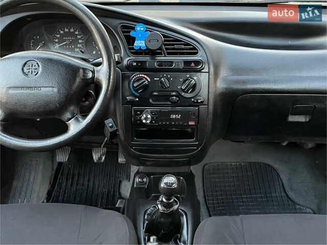 Синій Деу Ланос, об'ємом двигуна 1.5 л та пробігом 140 тис. км за 1450 $, фото 12 на Automoto.ua