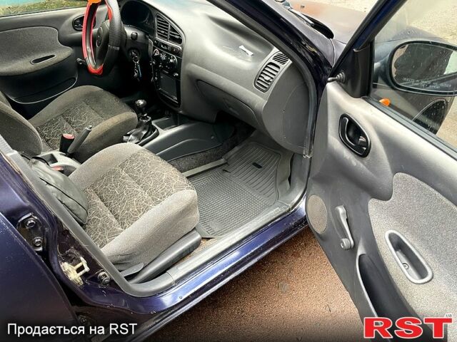 Синій Деу Ланос, об'ємом двигуна 1.5 л та пробігом 245 тис. км за 1650 $, фото 4 на Automoto.ua