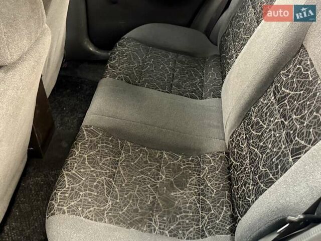 Синий Дэу Ланос, объемом двигателя 1.5 л и пробегом 240 тыс. км за 2600 $, фото 19 на Automoto.ua