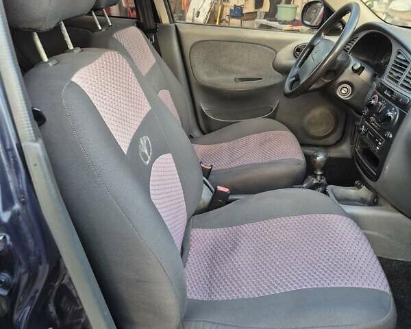 Синий Дэу Ланос, объемом двигателя 1.6 л и пробегом 125 тыс. км за 1600 $, фото 20 на Automoto.ua