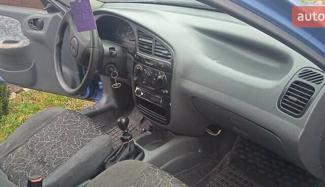 Синий Дэу Ланос, объемом двигателя 1.5 л и пробегом 157 тыс. км за 1550 $, фото 9 на Automoto.ua