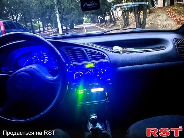 Синій Деу Ланос, об'ємом двигуна 1.4 л та пробігом 200 тис. км за 1999 $, фото 5 на Automoto.ua