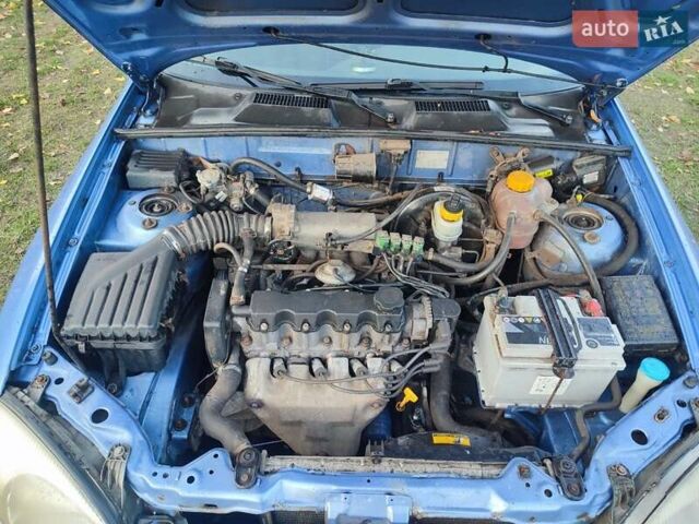 Синій Деу Ланос, об'ємом двигуна 1.5 л та пробігом 188 тис. км за 2000 $, фото 9 на Automoto.ua