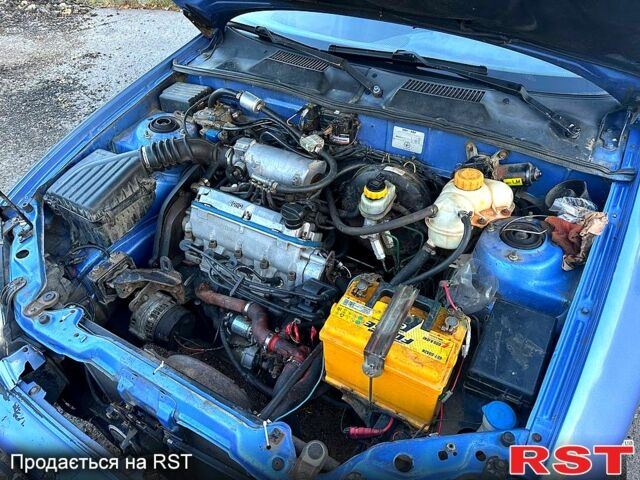 Синій Деу Ланос, об'ємом двигуна 1.4 л та пробігом 250 тис. км за 2000 $, фото 3 на Automoto.ua